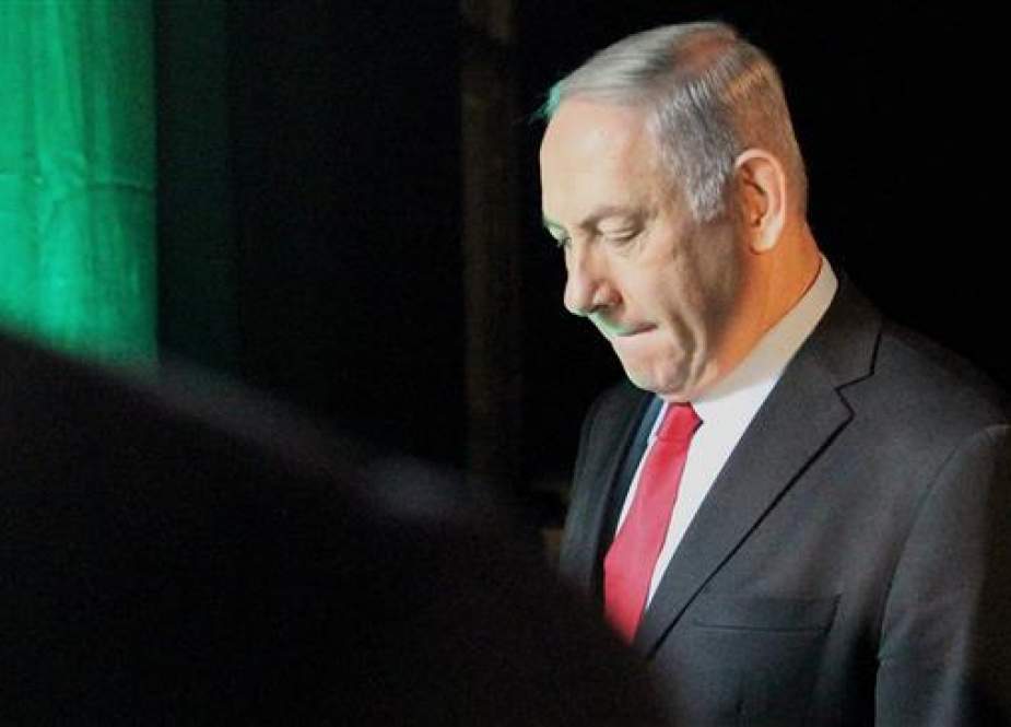 Israeli Prime Minister Benjamin Netanyahu leaves the Muni World conference in Tel Aviv.jpg