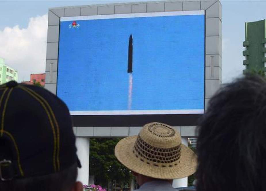 Pyongyang residents watch the successful launch of the intercontinental ballistic missile Hwasong-14..jpg