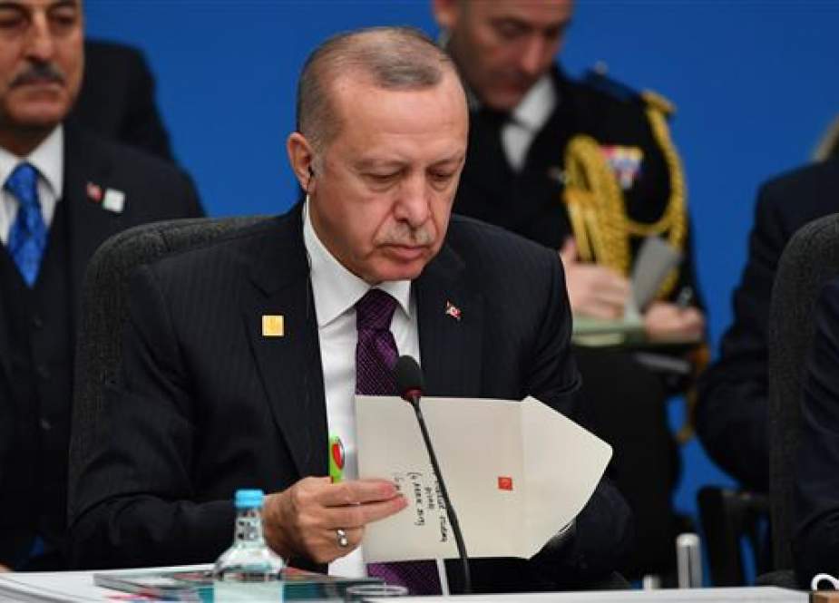 Turkish President Recep Tayyip Erdogan during a NATO leaders meeting, in Watford, Hertfordshire, England.jpg