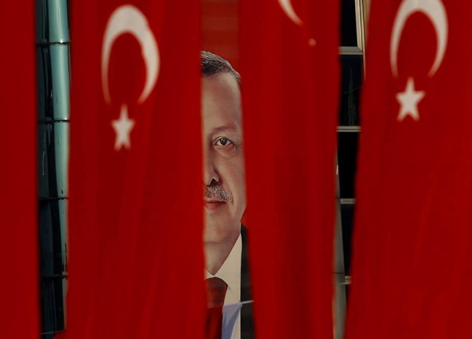 Erdogan and Turkish flags.jpg