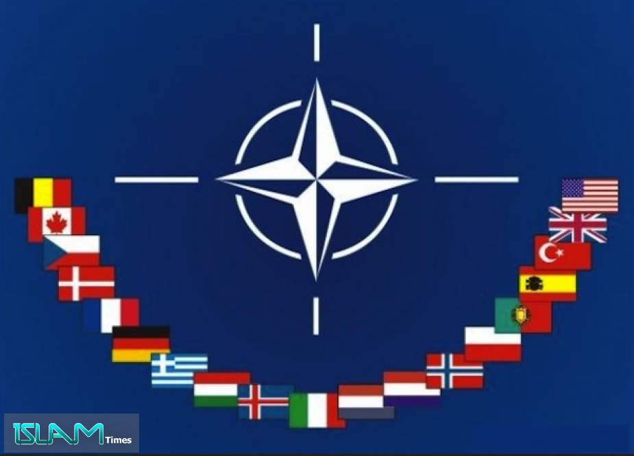 NATO suspends activities in Iraq