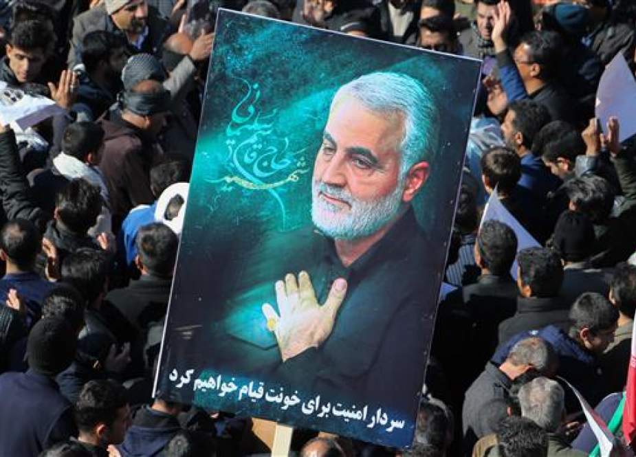 Iranian mourners gather during the funeral procession for General Qassem Soleimani, in Kerman.jpg