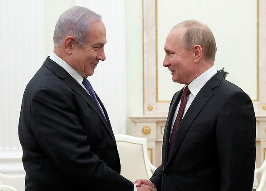 Russian President Vladimir Putin shakes hands with Israeli Prime Minister Benjamin Netanyahu.jpg