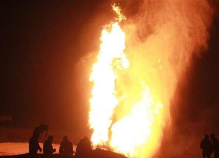Fire burning on a gas pipeline in the Massaeed of al-Arish, North of Sinai, Egypt.jpg