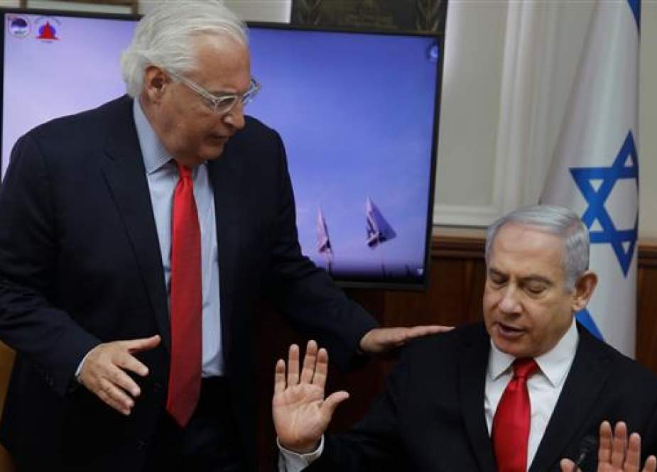 Israeli Prime Minister Benjamin Netanyahu talks with US ambassador to Israel David Friedman.jpg