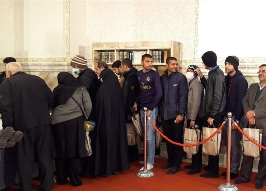Iranian people cast in ballot boxes.jpg
