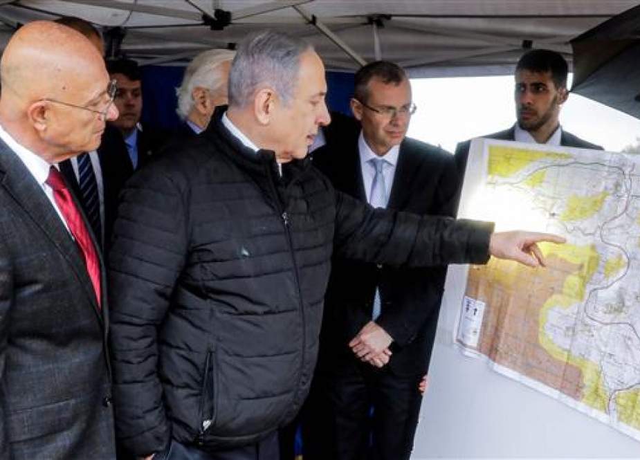 Israeli prime minister Benjamin Netanyahu checks a map the Israeli settlement of Ariel.jpg