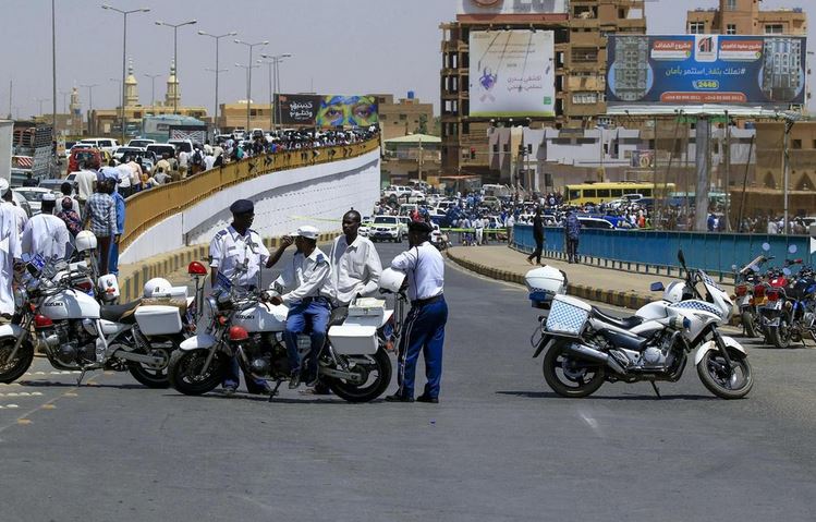 Sudanese security forces stand guard at the cordoned-off site of an assassination attempt against Sudan's Prime Minister Abdalla Hamdok, who survived the attack with explosives unharmed, in the capital Khartoum. AFP