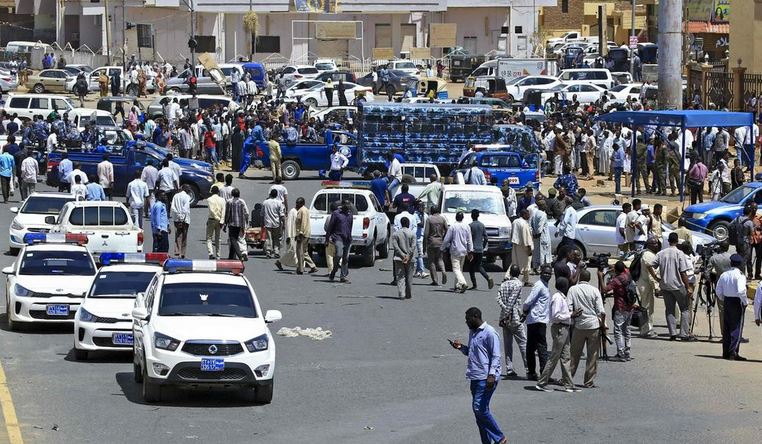 Sudanese rescue teams and security forces gather at the site of an assassination attempt against Sudan's Prime Minister Abdalla Hamdok, who survived the attack with explosives unharmed, in the capital Khartoum.