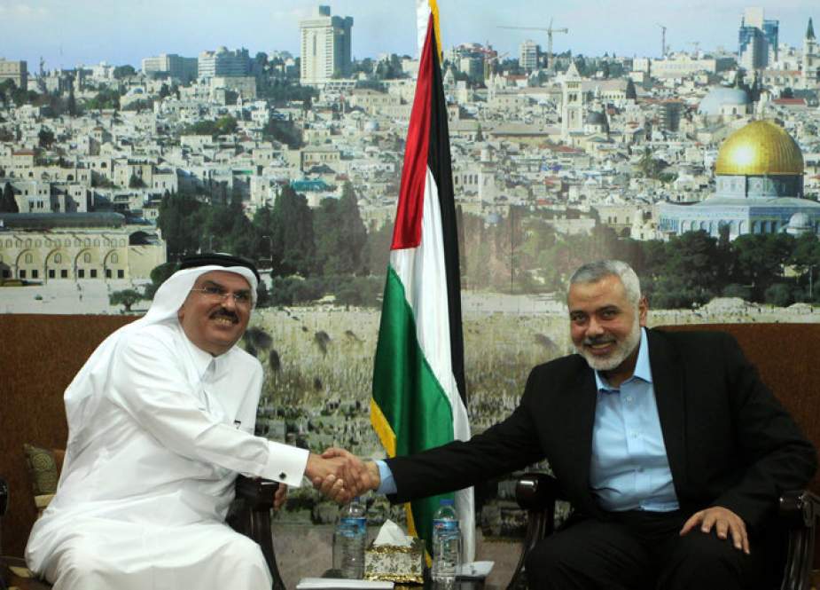 Qatari official Mohammed al-Emadi visits Hamas leader Ismail Haniyeh in Gaza City.jpg