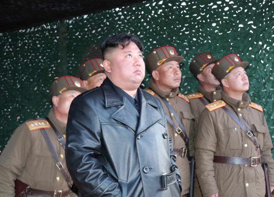 North Korean leader Kim Jong Un observes the firing of suspected missiles.JPG