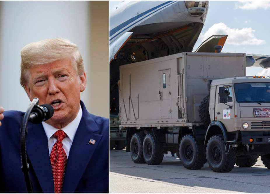 US President Donald Trump and Russian servicemen load medical equipment and disinfection vehicles.jpg