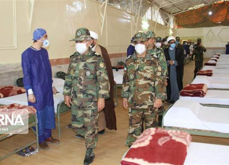 Members of the Iranian Armed Forces at a field hospital set up to help the fight against the new coronavirus.jpg