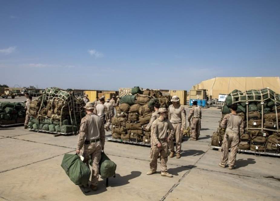 US Marines prepare their gear for departure from Al-Taqaddum, Iraq.jpg