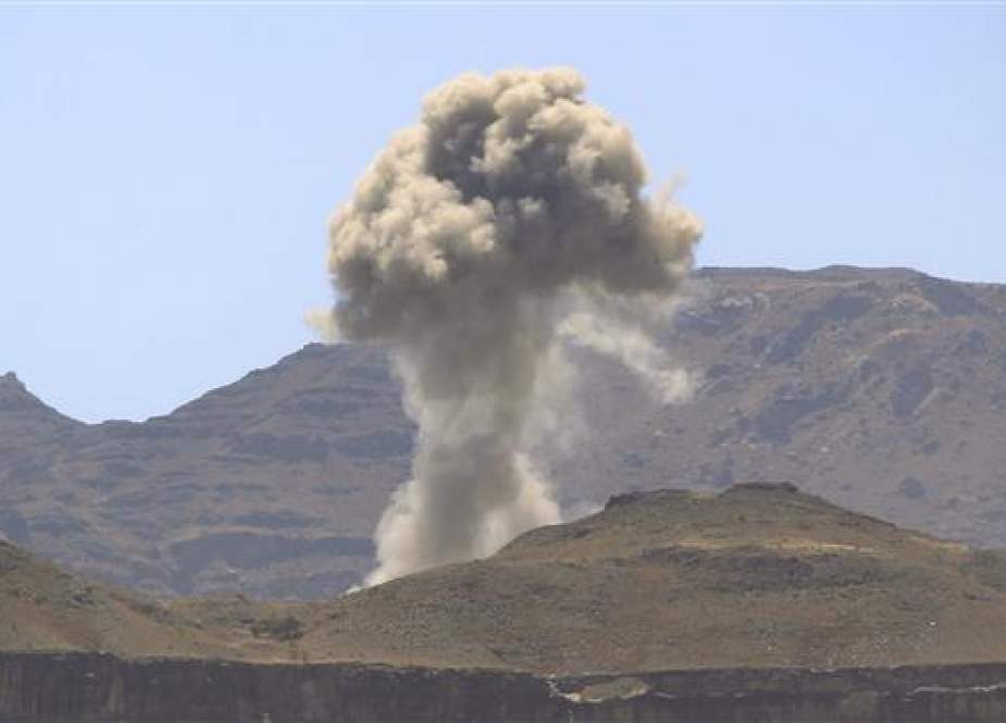 Smoke billowing following an air strike by the Saudi-led coalition in the Yemeni capital Sanaa.jpg