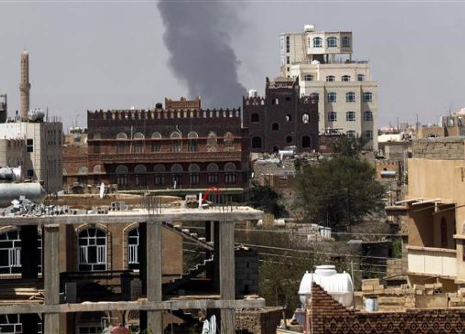 Smoke billows from the site of a Saudi-led airstrike in Sana, Yemen.jpg