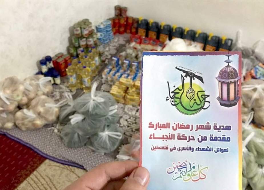 بسته‌های معیشتی مقاومت نُجَبای عراق در فلسطین توزیع شد