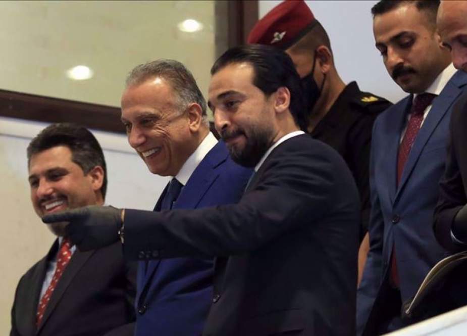 Mohamed Al-Halbousi (3rd, R) welcomes Iraqi PM-designate Mustafa al-Kadhimi.jpg