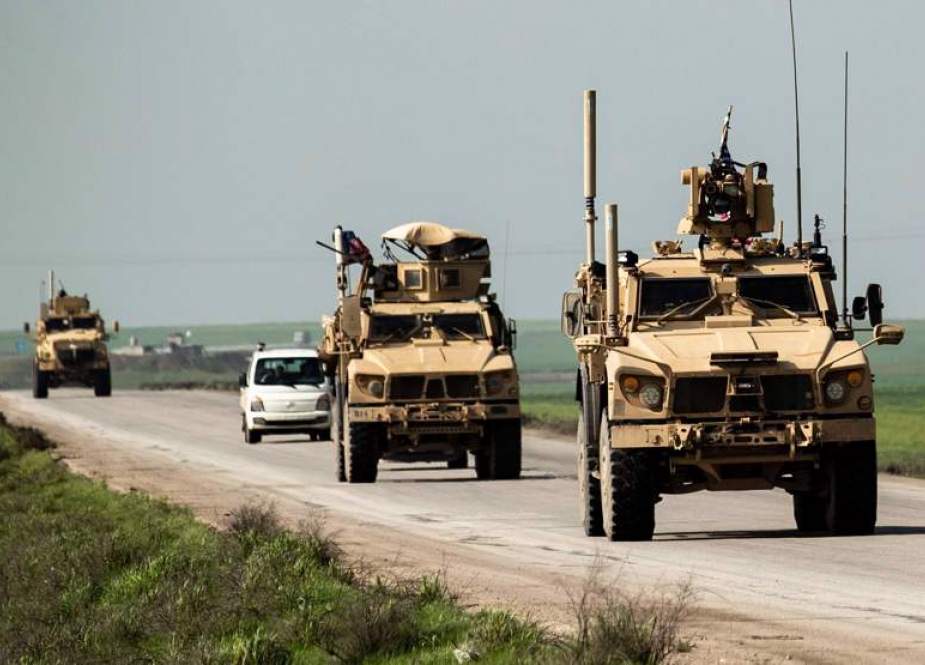 US forces patrol the M4 highway between the Kurdish-majority city of Qamishli and Hasakeh in northeast Syria,.jpg