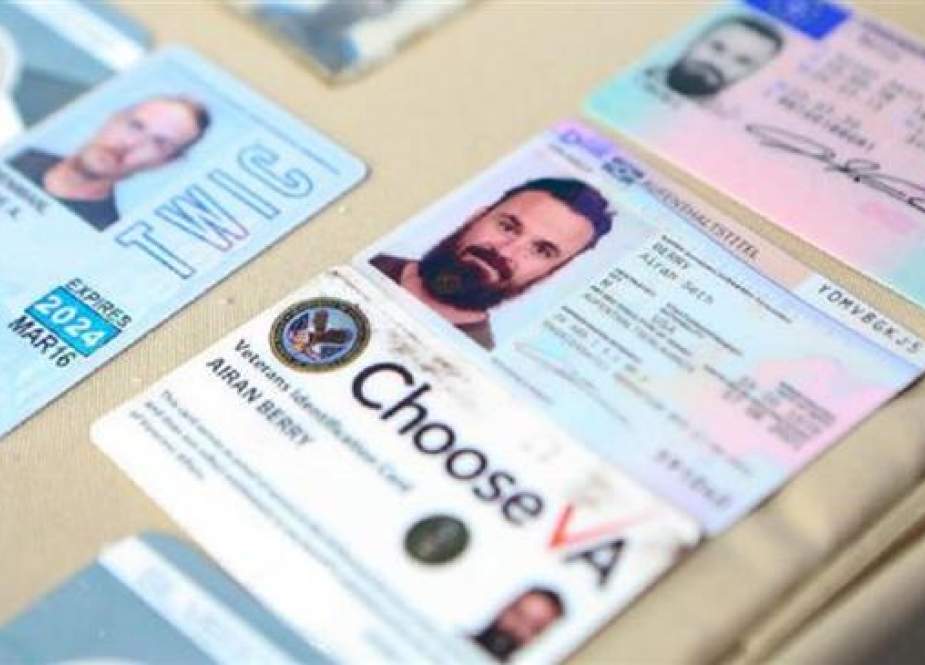 ID cards of former US special forces citizen Airan Berry, right, and Luke Denman, left, in Caracas, Venezuela.jpg