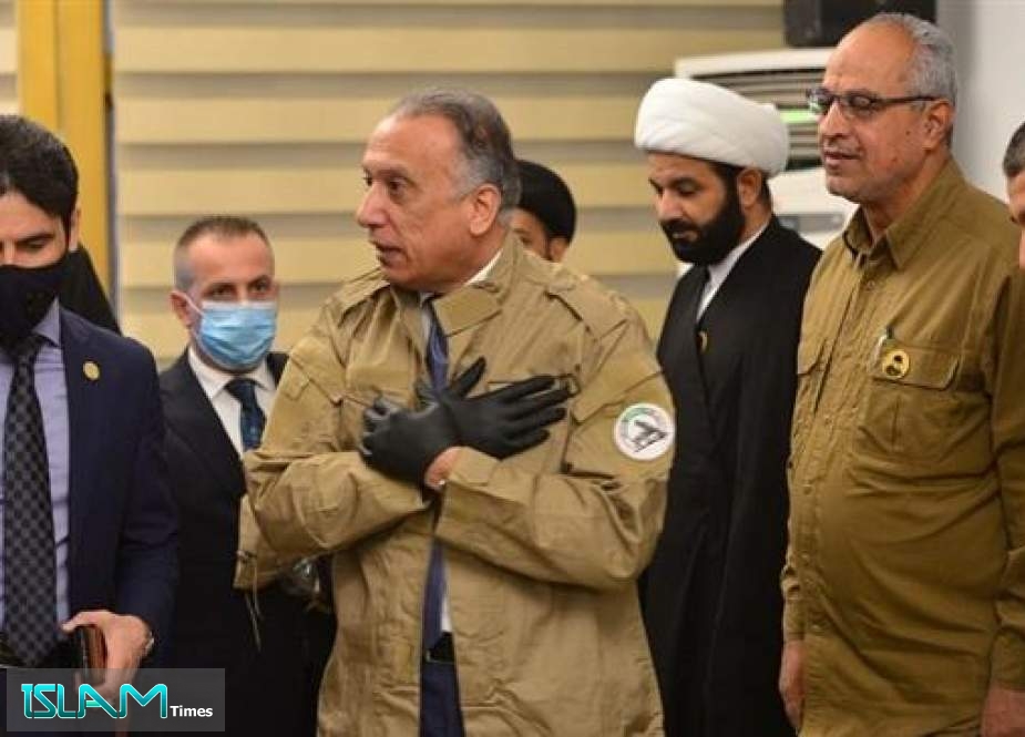 Iraqi PM Wears Hashd al-Sha