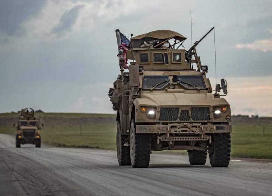 US military convoy patrols the M4 strategic highway, near the US base in Tal Baydar.jpg