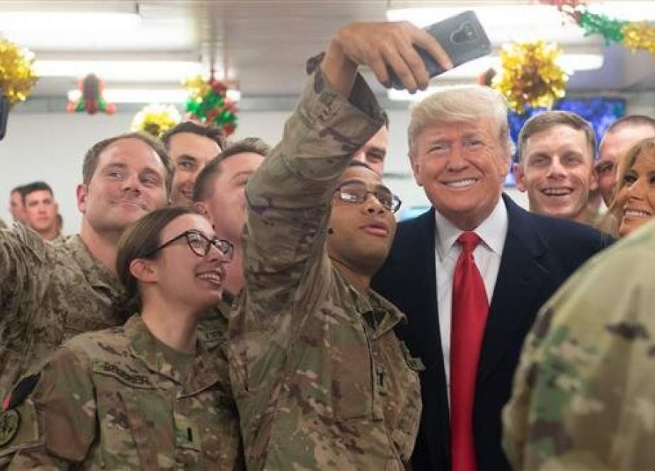 US President Donald Trump and First Lady Melania Trump with the US military at Al Asad Air Base in Iraq.jpg