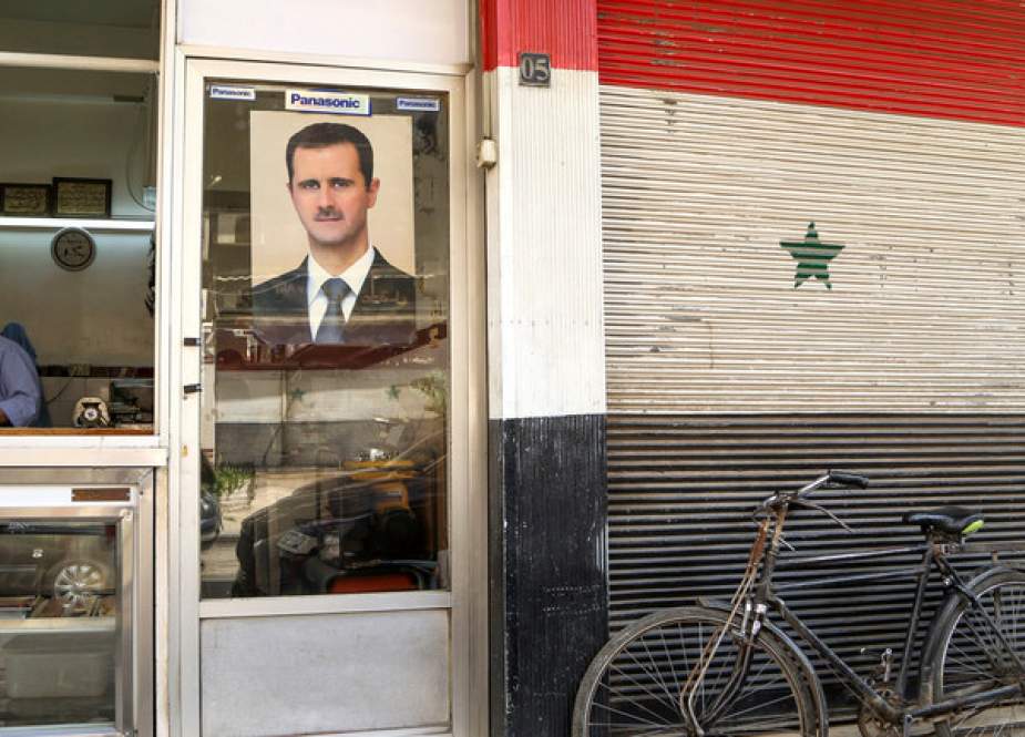 Picture of Syrian President Bashar al-Assad on a shop in Damascus, Syria.JPG