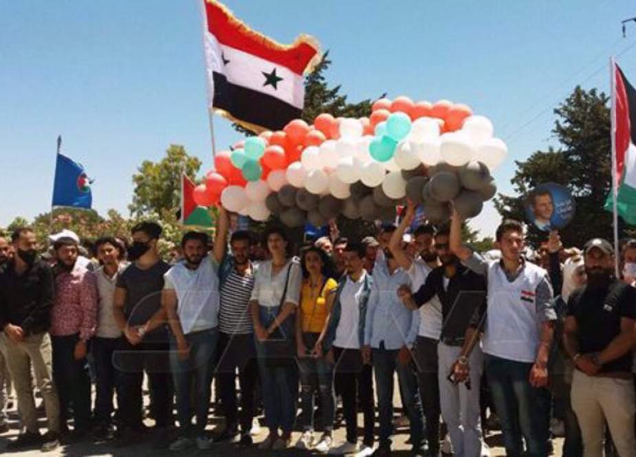 Syrians at al-Tahrir square in Quneitra hold a rally to demand liberation of the Golan Heights.jpg