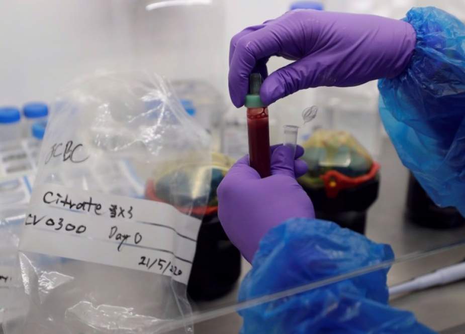 Coronavirus disease being prepared for analysis at a lab in Cambridge, Britain.jpg