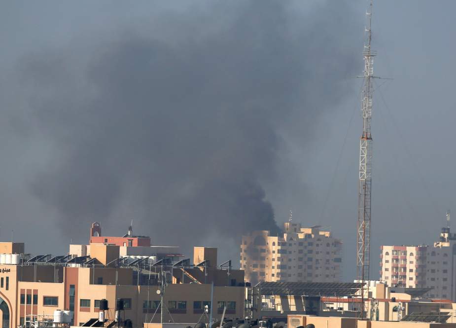 Smoke rises after an Israeli forces strike in Gaza City.jpg