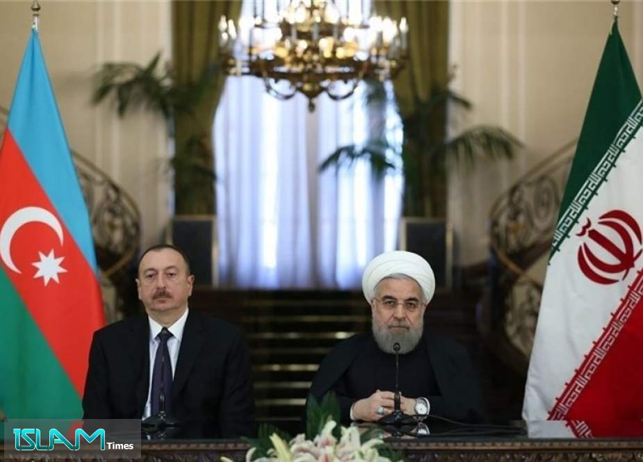 Rouhani: Foreign Intervention Could Turn Karabakh Fighting into Regional War