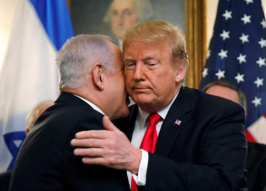 Israeli PM Benjamin Netanyahu hugs US President Donald Trump at the White House.jpg