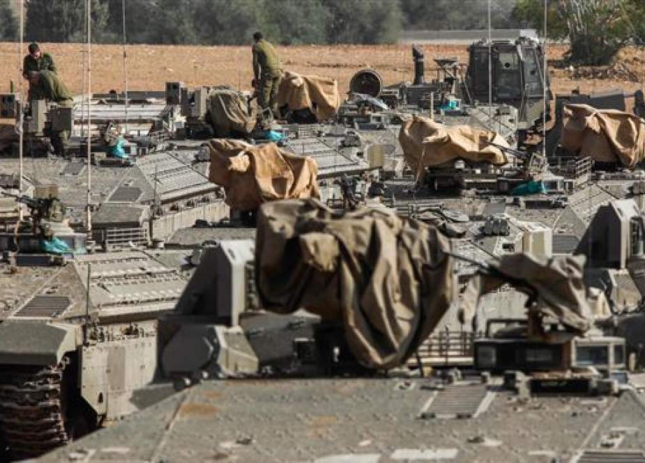 Israeli armored vehicles near the border with the Gaza Strip.jpg