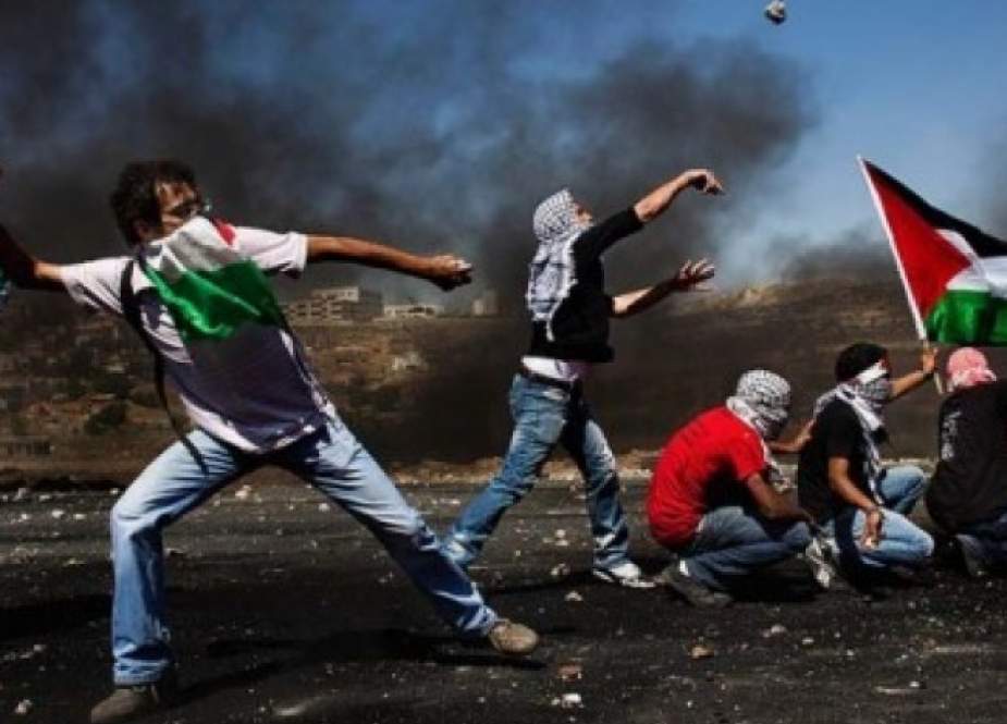 Palestinians protesting against their raid.jpg