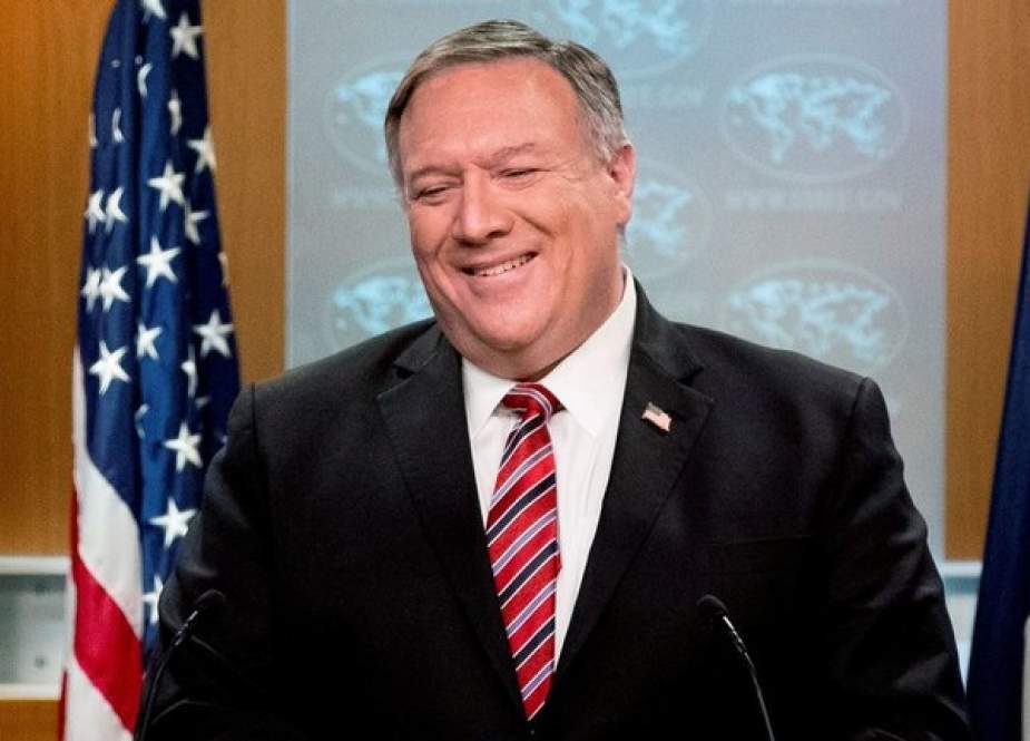 Mike Pompeo smiles during a news conference.JPG