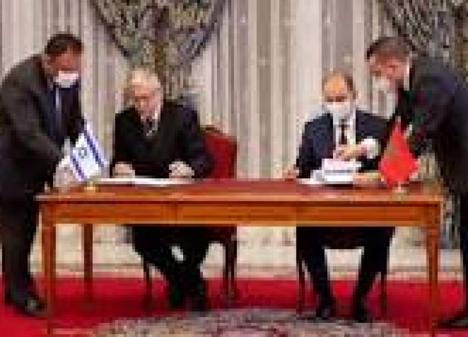 Moroccan and Israeli officials sign MoU during a visit by Israeli envoys to Rabat, Morocco.jpg