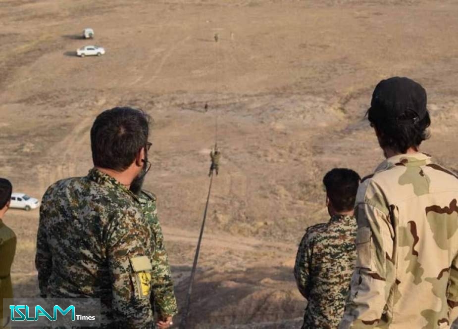 Commander Dismisses Reports of Israeli Strike on Fatemiyoun Base in Syria