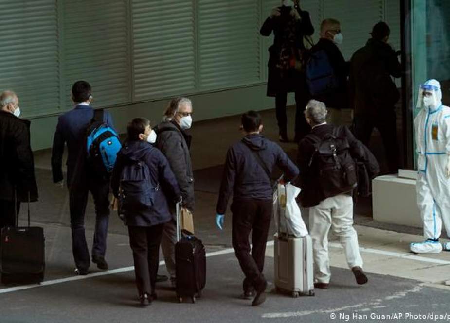 WHO experts as they arrived in Wuhan.jpg