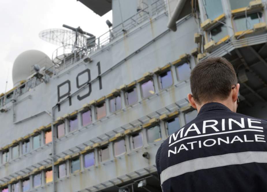 French Navy sailor is seen onboard the Charles de Gaulle aircraft carrier.JPG