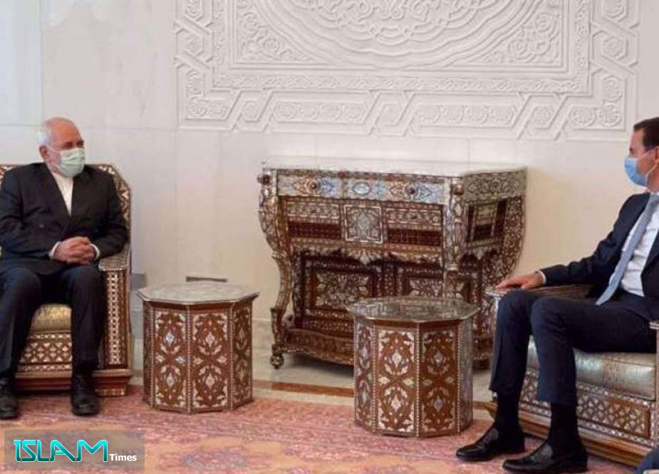 Zarif Meets Syria’s Assad
