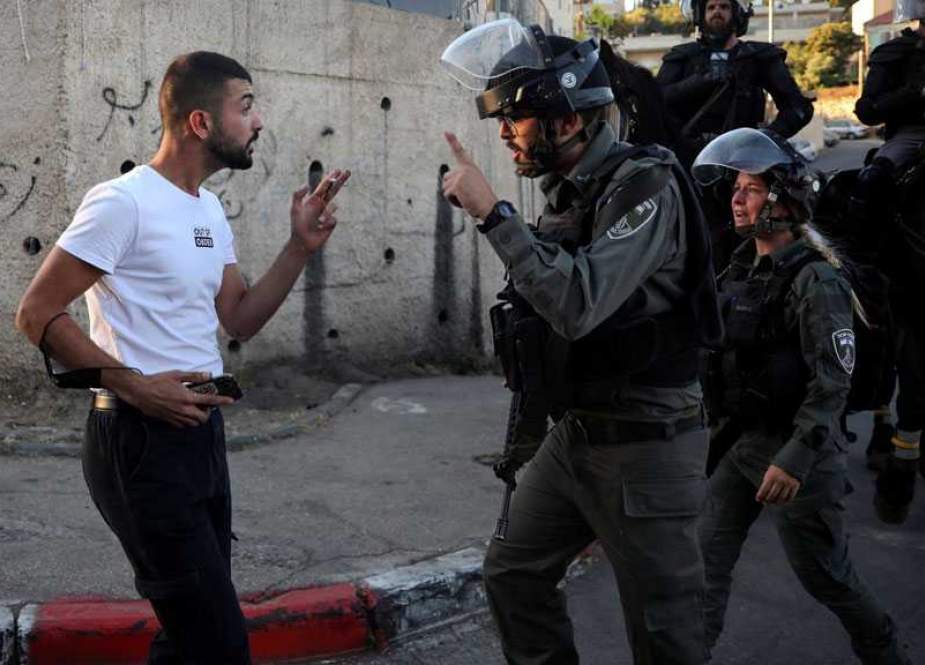Palestiian vs Zionist police.jpg