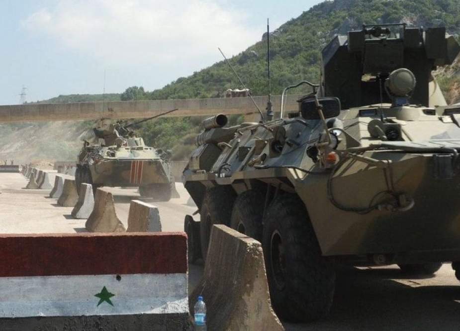 Terrorists transfer armored vehicles to two localities in Syria’s Idlib.jpg