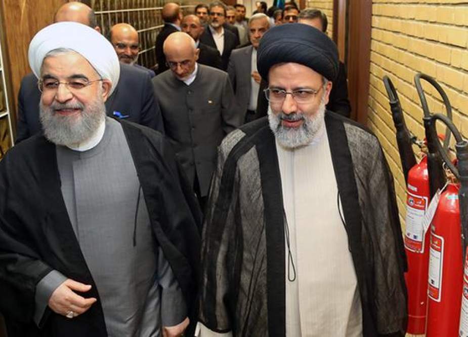 روحاني يعلن فوز رئيسي بالجولة الأولى للانتخابات الإيرانية