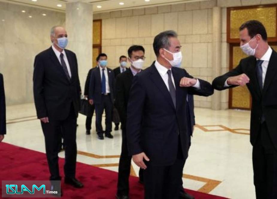 Syrian President Discusses with Chinese Foreign Minister Boosting Bilateral Relations