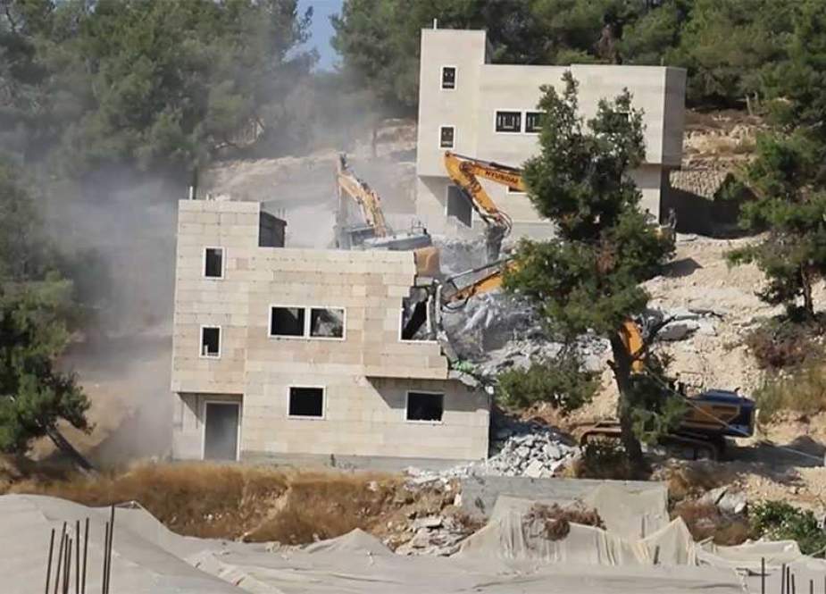 Zionist occupation authorities demolished three Palestinian houses in Sa’ir town.jpg