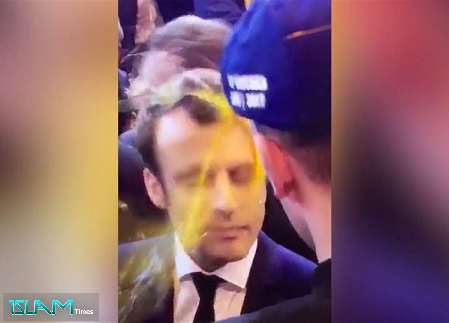 Egg on His Face: Macron Splattered by Protester on French Campaign Trail