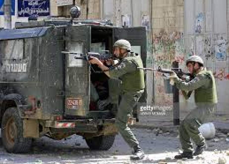 Israeli occupation forces shooting at Palestinians.jpg