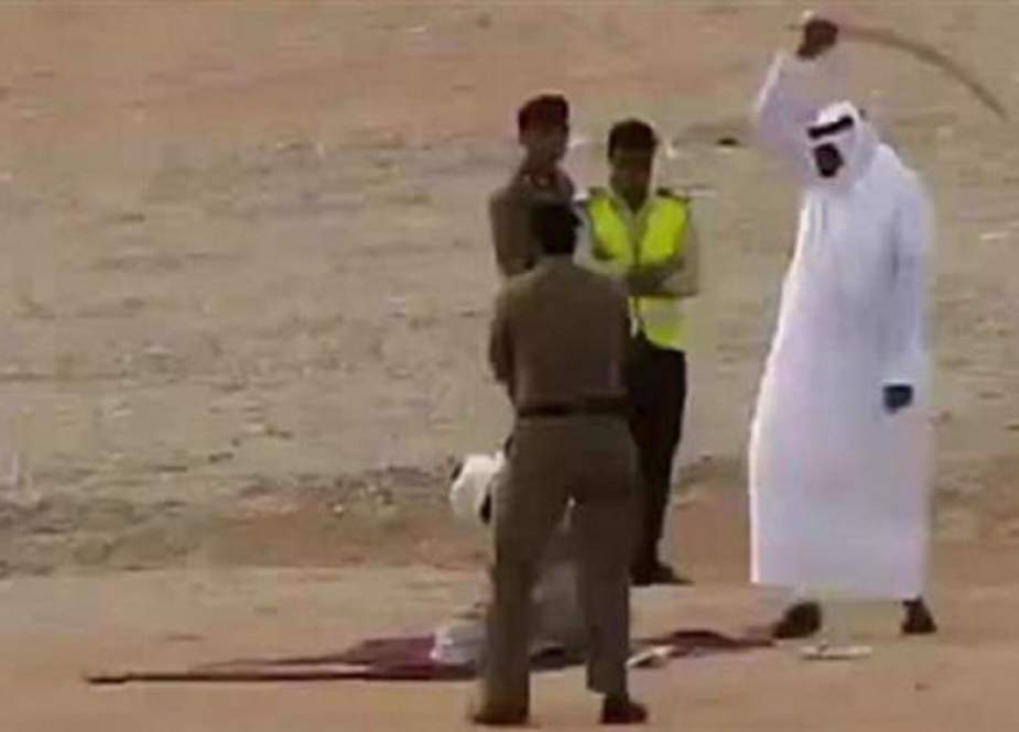 Man kneeling before being beheaded in Saudi Arabia..jpg