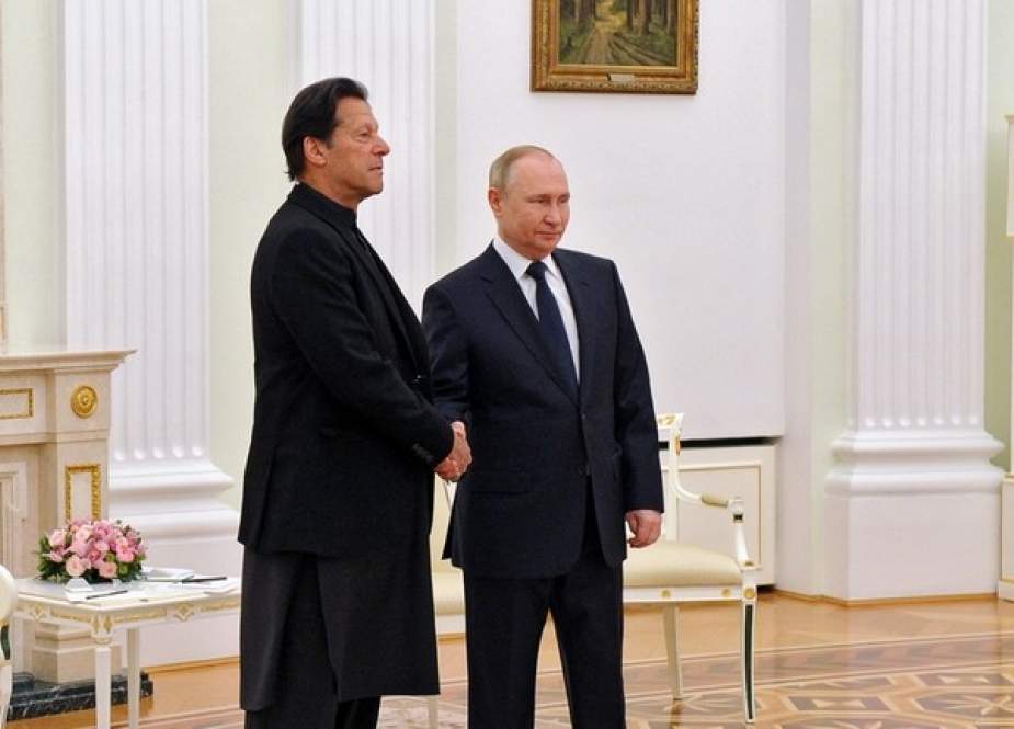 Russian President Vladimir Putin and Pakistani Prime Minister Imran Khan shake hands during a meeting in Moscow, February 24, 2022